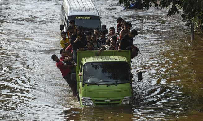 Flood waters submerge several parts of Jakarta, Indonesia