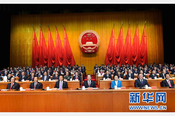 10月1日，慶祝中華人民共和國成立66周年暨新疆維吾爾自治區(qū)成立60周年大會在新疆人民會堂隆重舉行。 新華社記者 饒愛民 攝