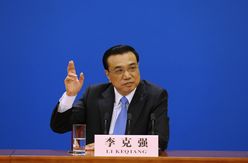 3月15日，國(guó)務(wù)院總理李克強(qiáng)在北京人民大會(huì)堂與中外記者見(jiàn)面，并回答記者提問(wèn)。 新華社記者 沈伯韓 攝