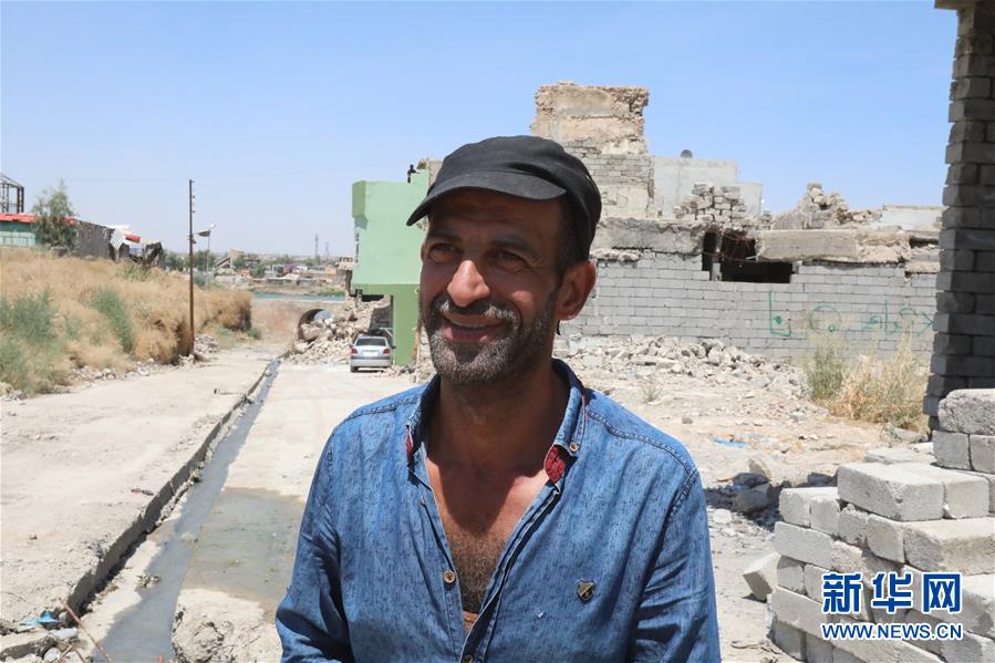 (國(guó)際·圖文互動(dòng))(4)通訊:中企員工愛(ài)心捐款助摩蘇爾老城民眾重燃生活希望