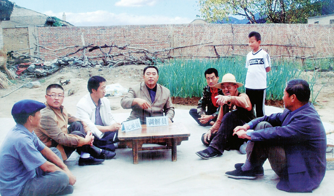 調(diào)解&ldquo;家長(zhǎng)里短，雞毛蒜皮&rdquo;的小事情是李培斌從事的大事業(yè)