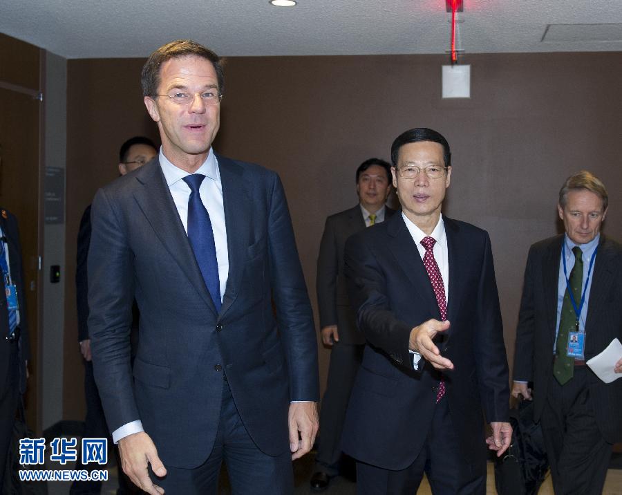 9月23日，出席聯(lián)合國氣候峰會的國家主席習(xí)近平特使、國務(wù)院副總理張高麗在紐約聯(lián)合國總部會見荷蘭首相呂特。 新華社記者 王曄 攝 