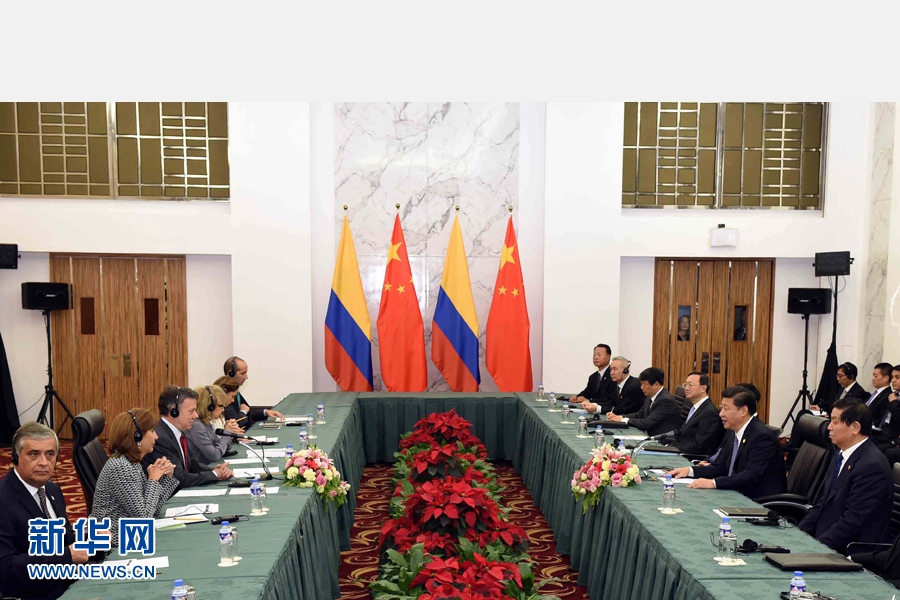 11月18日，國(guó)家主席習(xí)近平在菲律賓馬尼拉會(huì)見哥倫比亞總統(tǒng)桑托斯。 新華社記者 饒愛民 攝