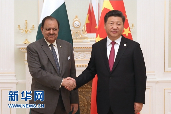 6月23日，國家主席習近平在塔什干會見巴基斯坦總統(tǒng)侯賽因。新華社記者馬占成攝