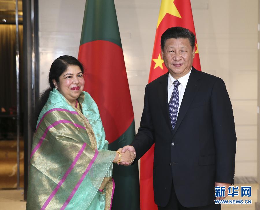 10月14日，國家主席習(xí)近平在達(dá)卡會見孟加拉國國民議會議長喬杜里。 新華社記者蘭紅光攝 
