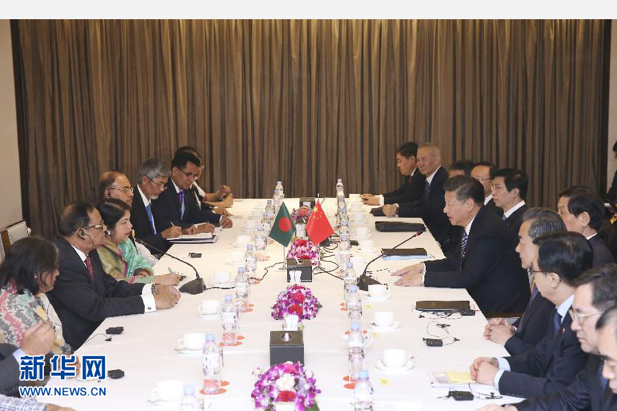10月14日，國家主席習(xí)近平在達(dá)卡會見孟加拉國國民議會議長喬杜里。 新華社記者龐興雷攝 