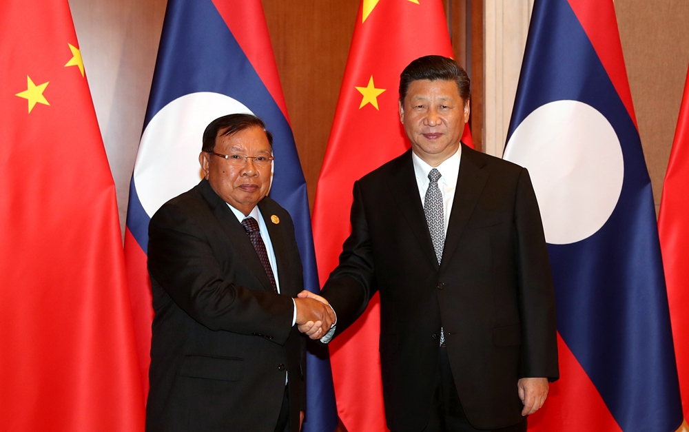 習(xí)近平同老撾人民革命黨中央總書記、國家主席本揚(yáng)舉行會談